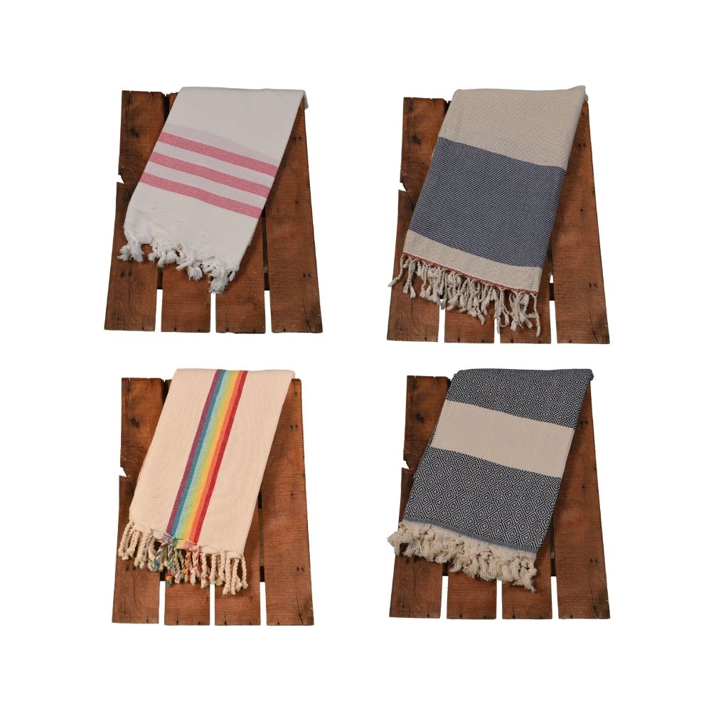 Enhance your beachwear collection with the luxury and quality of Wholesale Turkish Beach Towels from Cottonpolis. As a leading manufacturer in Denizli, Turkey, we offer an extensive collection of premium towels crafted from 100% Turkish cotton. Our beach towels are renowned for their softness, absorbency, quick-drying properties, and vibrant colors, making them the perfect choice for beachgoers and vacationers. We offer a wide variety of styles, sizes, and patterns to elevate your customers' beach experien